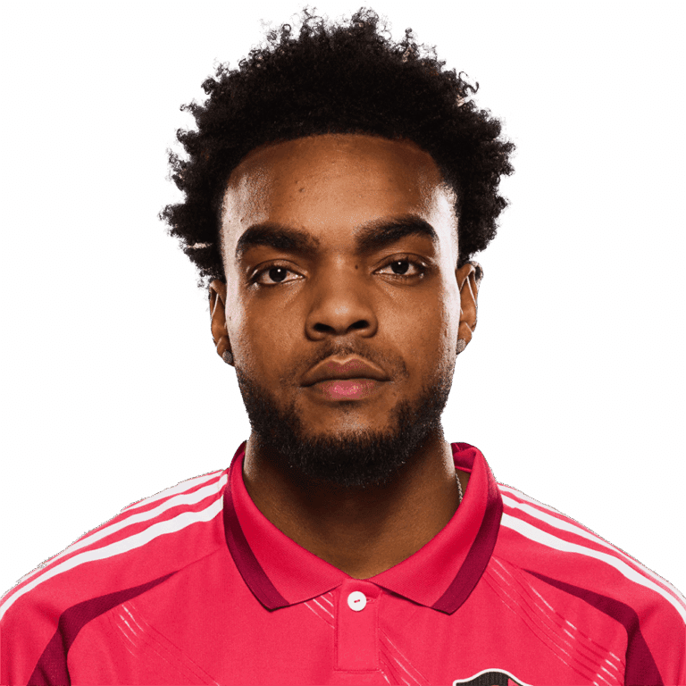 Meet J. Reid — The 6’4″ Brick Wall Wearing #99 Who Steals Goals, Hearts, and the Opponents’ Wi‑Fi